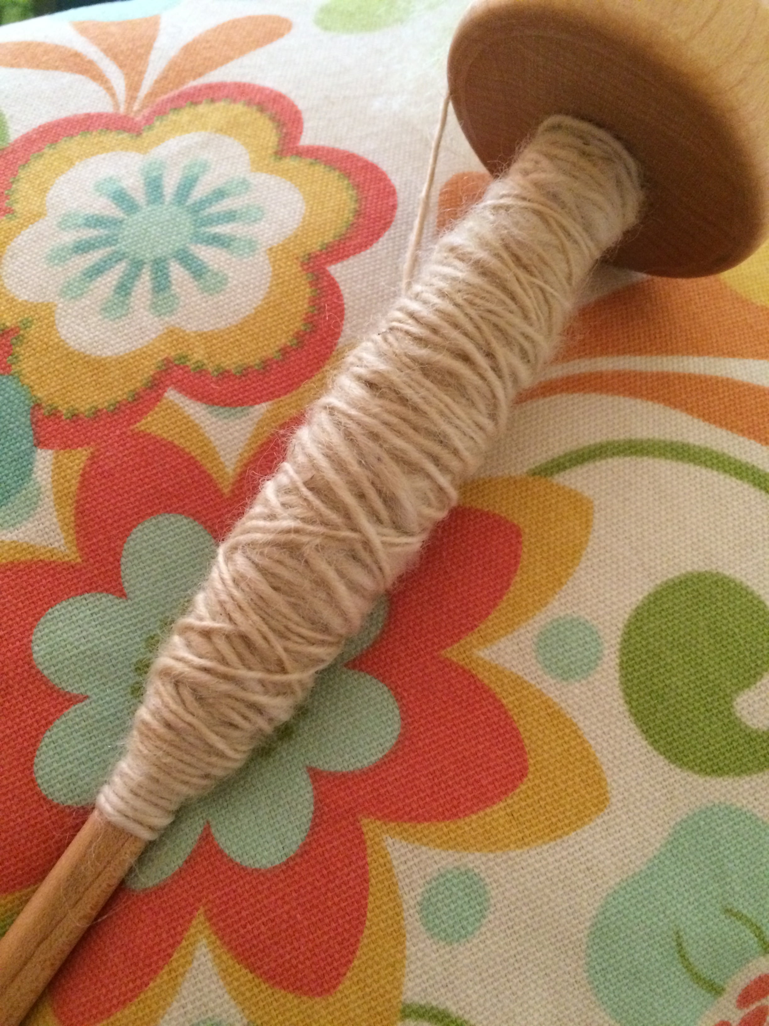 Yarn on a drop spindle